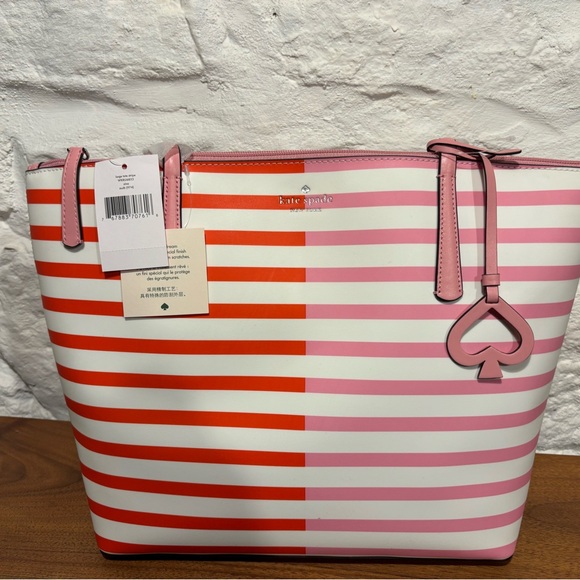 kate spade Handbags - Kate Spade Vibrant Pink and Orange Striped Tote